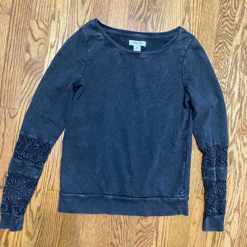 Lucky Lotus, faded black long sleeve top, with floral cut outs, size XS